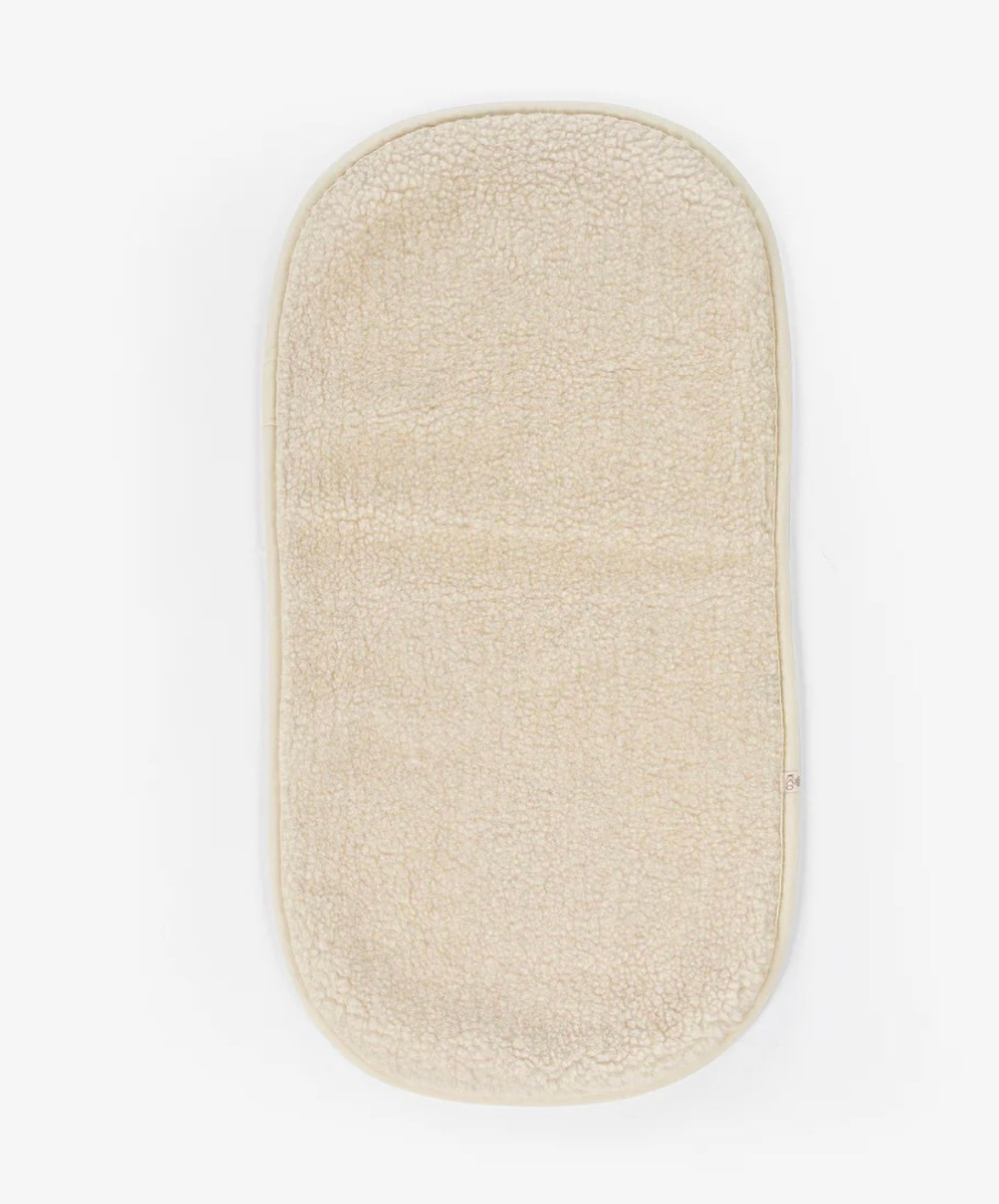 Onderlegger kinderwagen / reiswieg van merinwol - Kico label