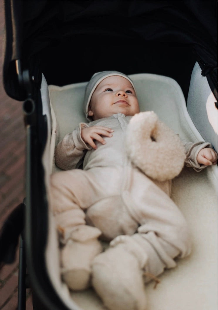 Onderlegger kinderwagen / reiswieg van merinwol - Kico label